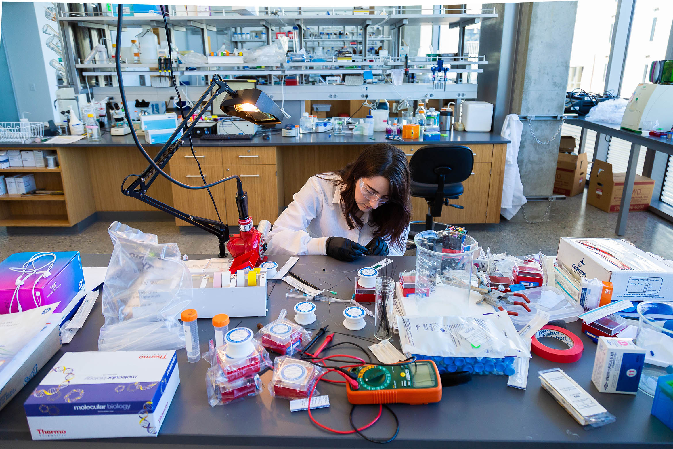 This is a student doing research in a lab.