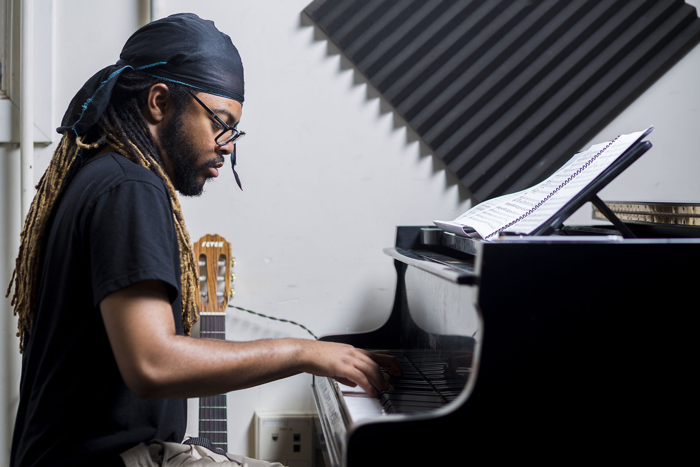 This is a student at a piano.