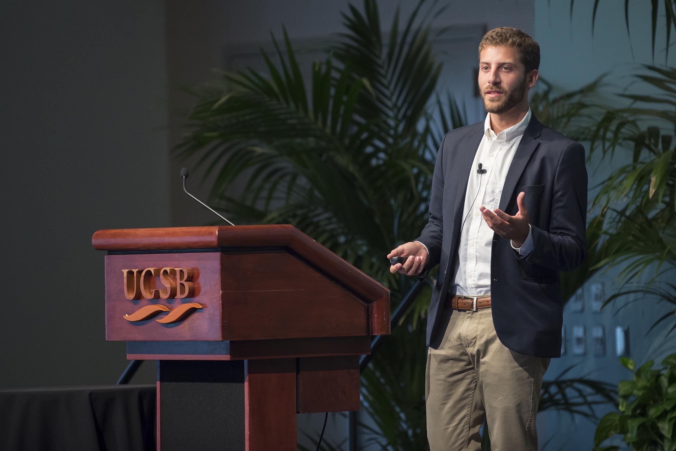 This is a student at a podium giving a TMP lecture.